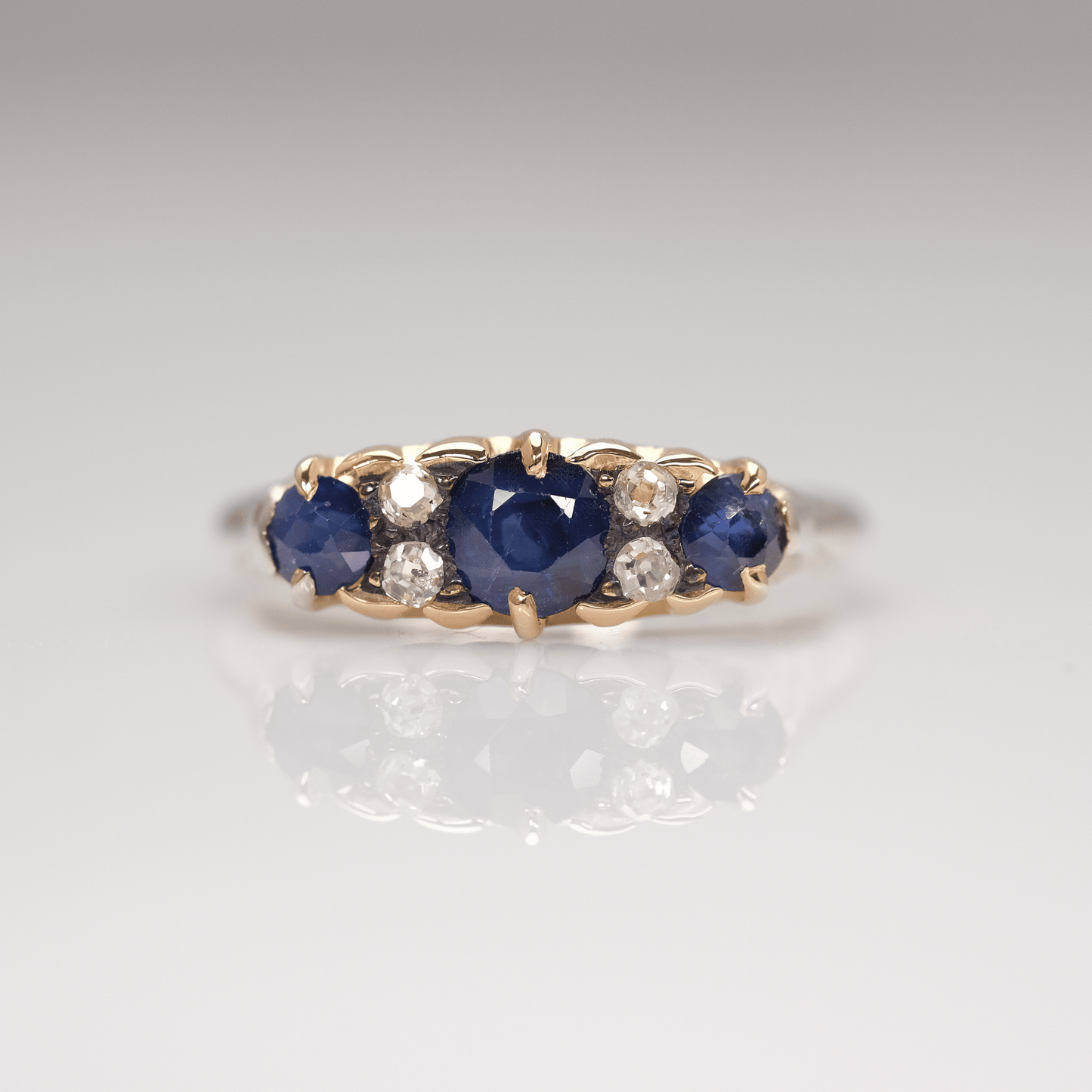 Art Deco Seven Stone Sapphire and Diamond Ring